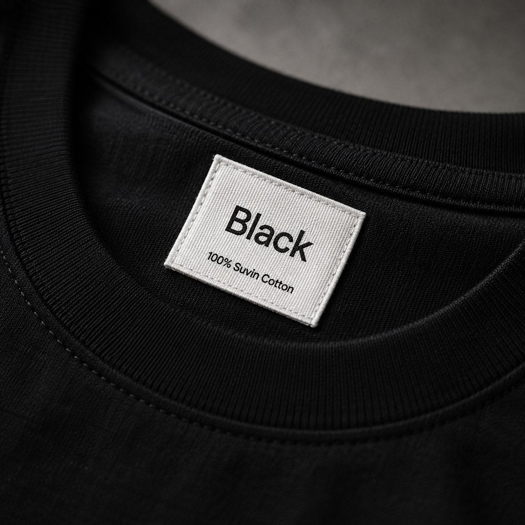 Neck label reading Black, 100% Suvin Cotton