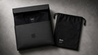 Open Black gift box with folded tee and dust bag