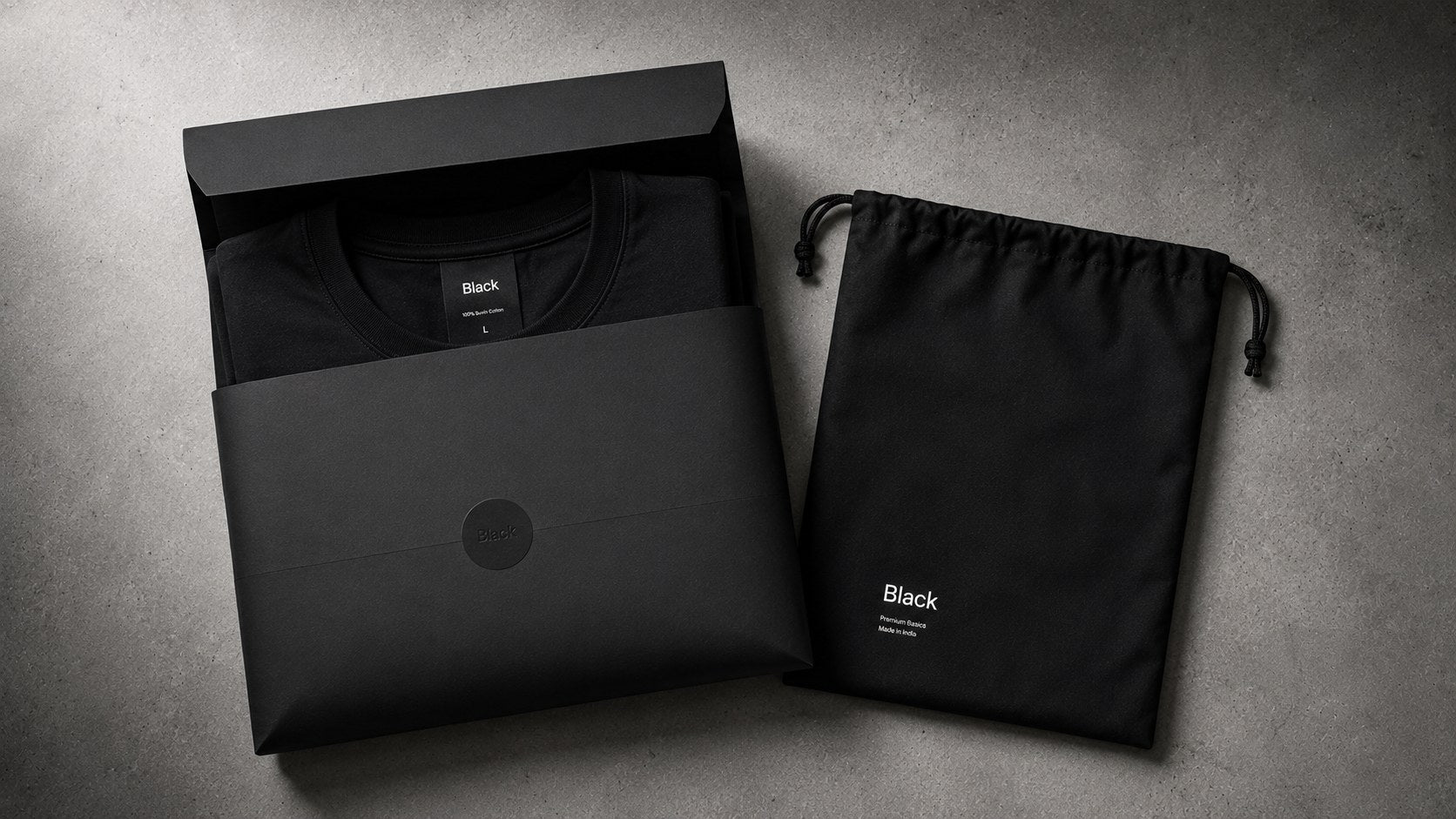 Open Black gift box with folded tee and dust bag